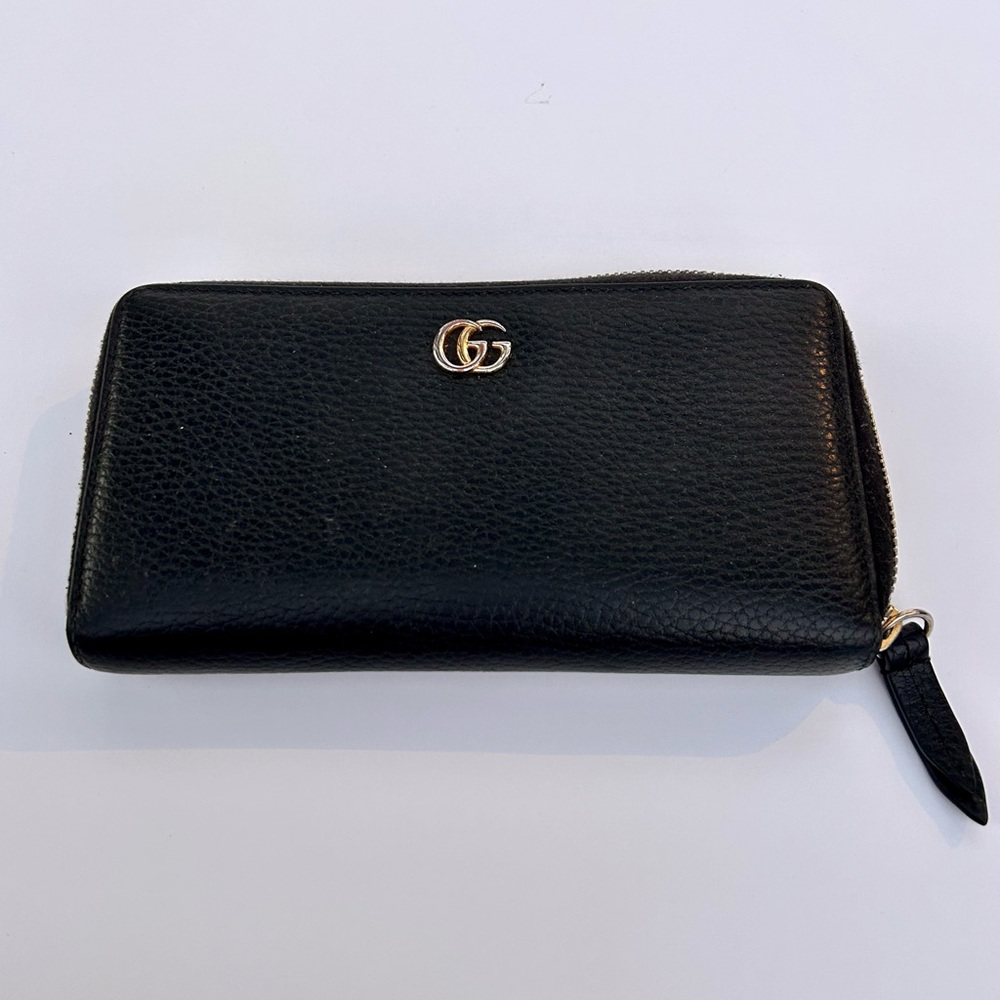 Black Gucci GG Marmont zip wallet in pre-loved condition